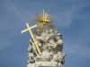 The peanuts gallery atop a monument in St Matthias square