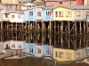 The palafitos of Castro, built out over the tidal waters of the harbour