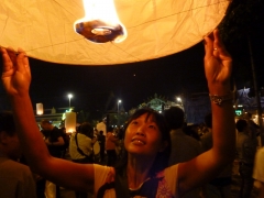 We launch a lantern on the bridge and watch it rise