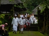All in white, specially dressed up for a day of offerings
